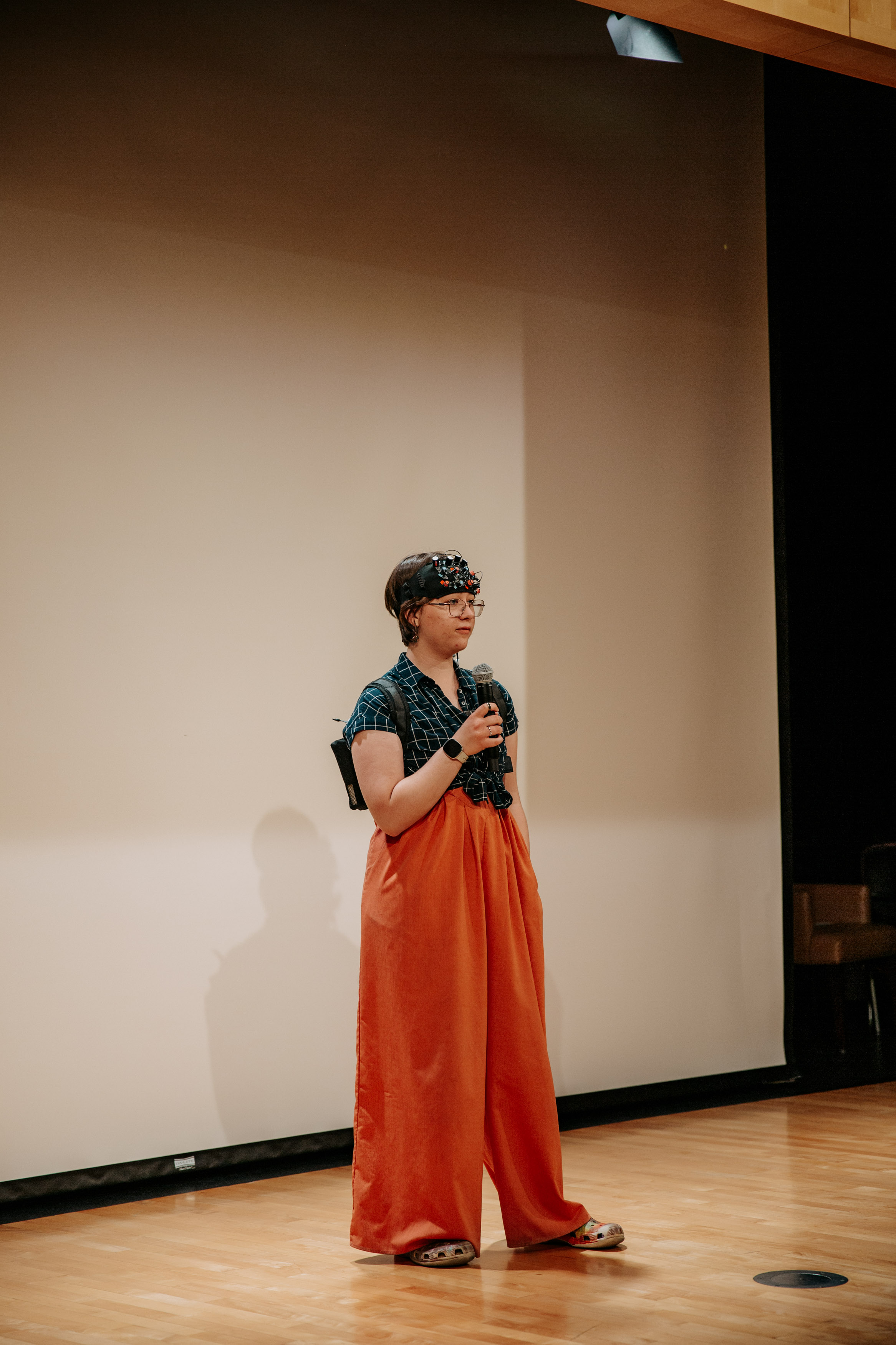Storyteller addresses the audience.