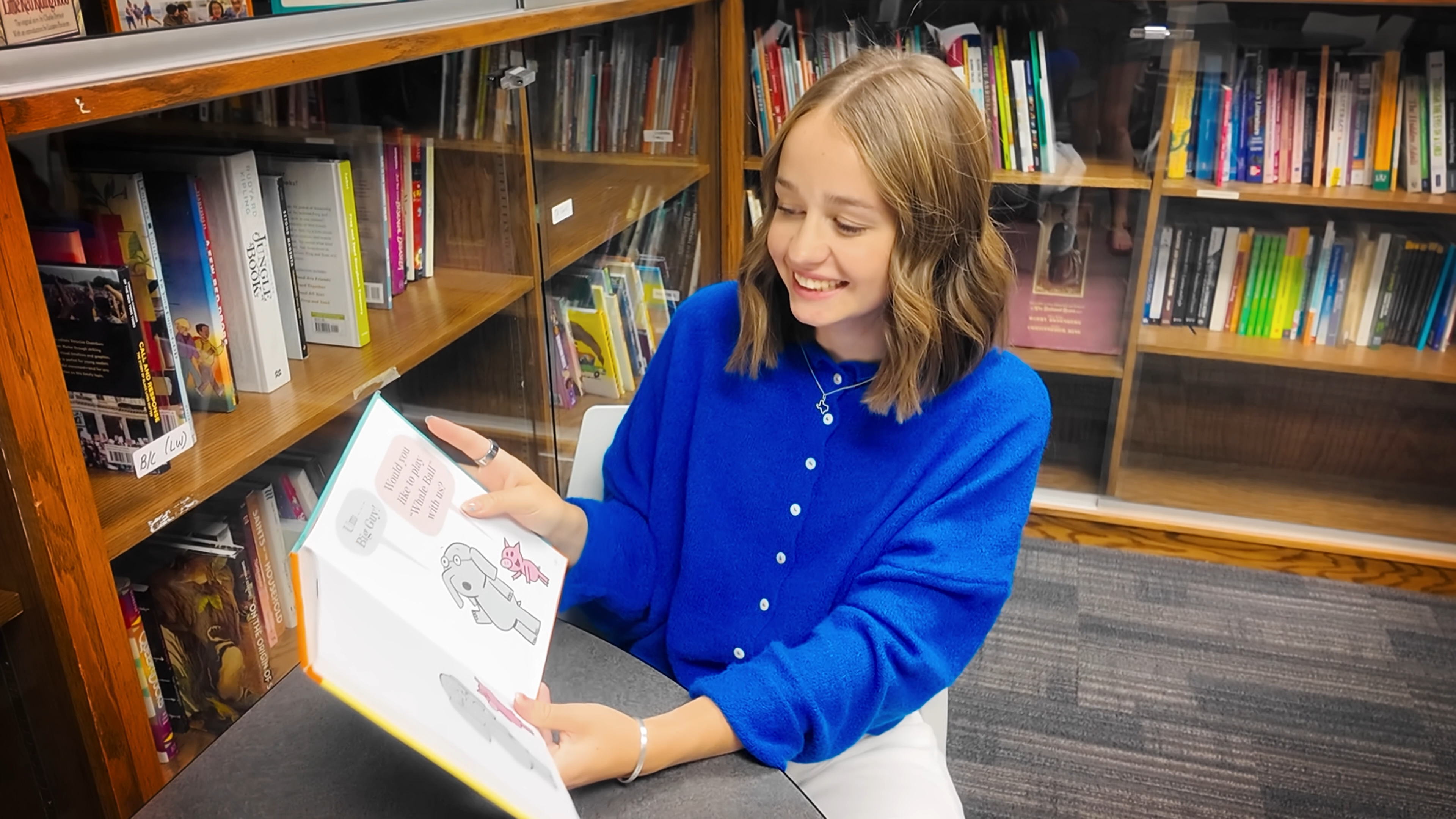 Kaitlyn with books