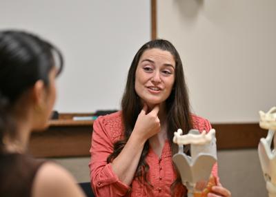 A doctor helping her patient