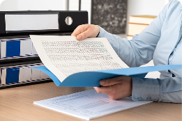Person holding folder